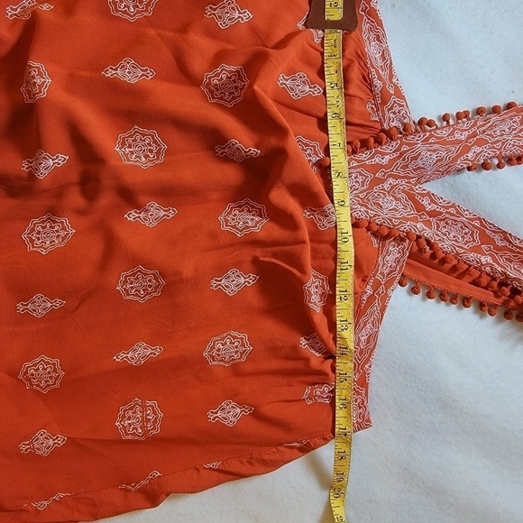 Loft medium orange top. Zipper back with shoulder straps with little pom poms. - Picture 2 of 15